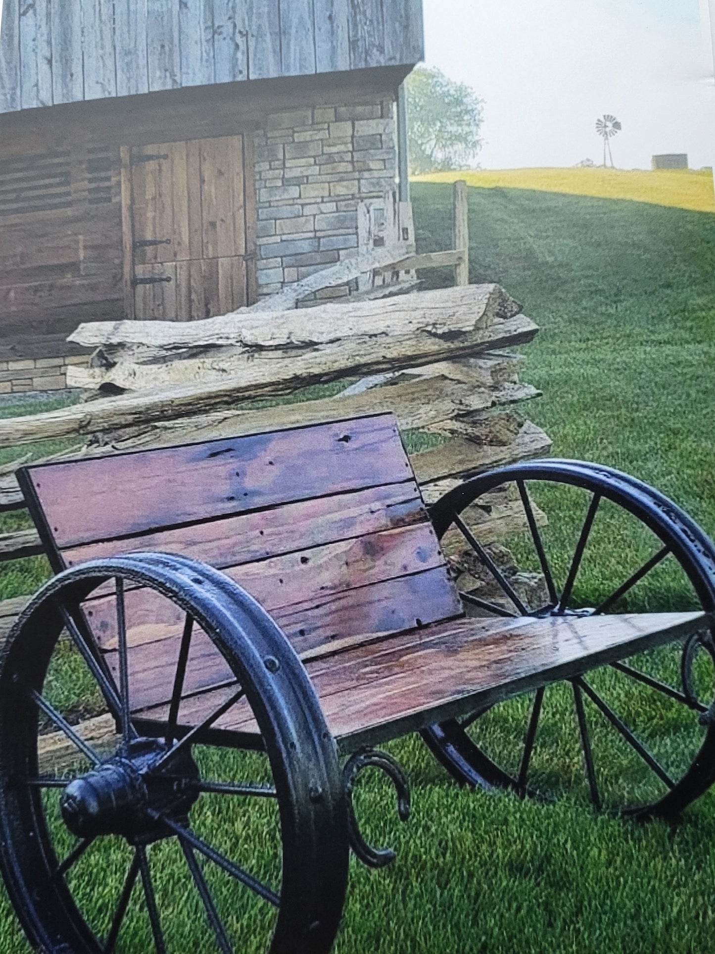 Eastern Red Cedar Bench with solid cast iron wagon wheels